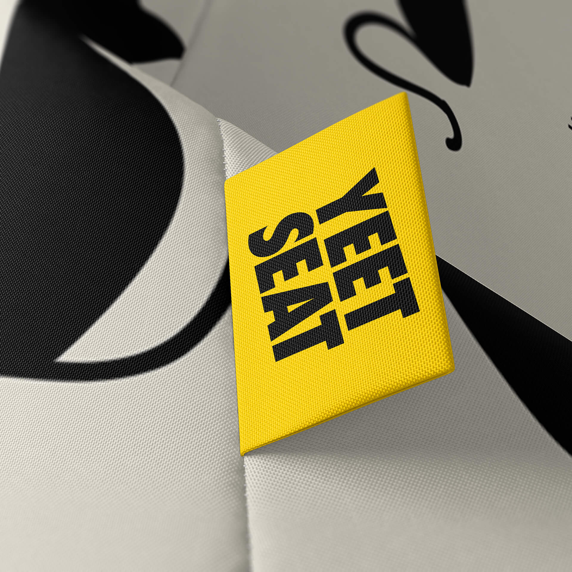 A vibrant Yeet Seat label on a bean bag side