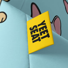 A vibrant Yeet Seat label on a bean bag side