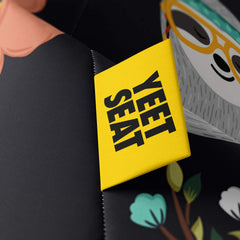 A vibrant Yeet Seat label on a bean bag side