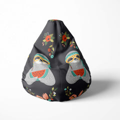 Front image of a beanbag with sloths holding watermelon and floral patterns on black.