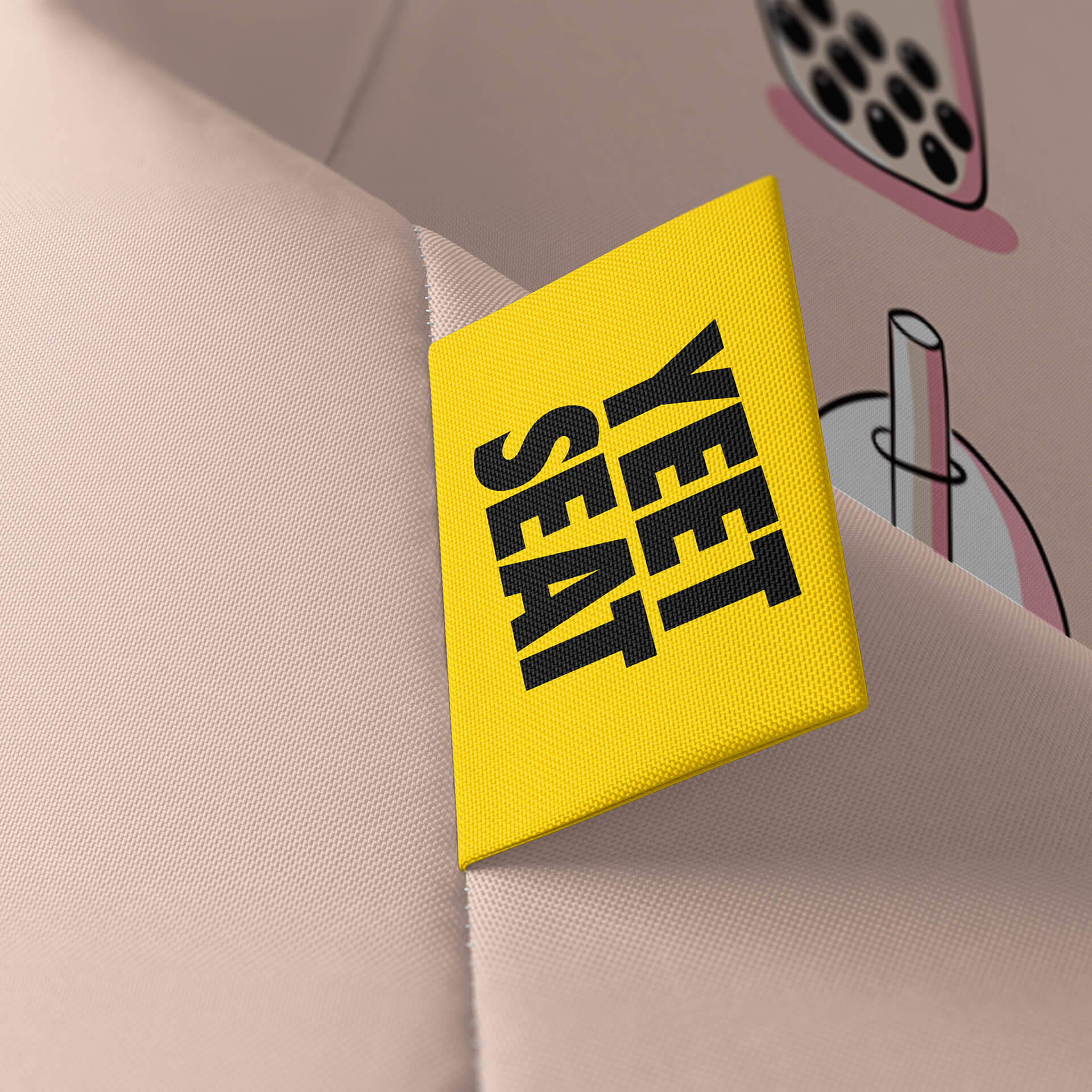 A vibrant Yeet Seat label on a bean bag side