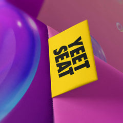 A vibrant Yeet Seat label on a bean bag side.