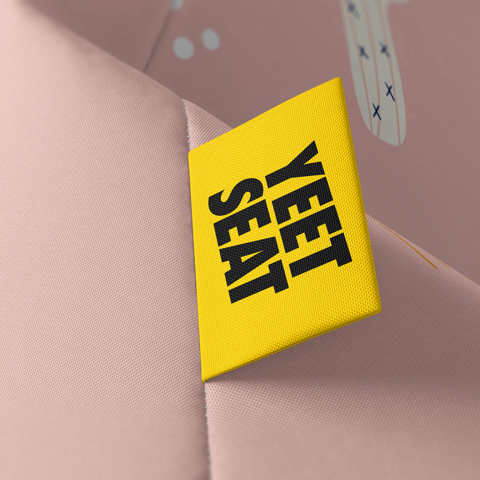A vibrant Yeet Seat label on a bean bag side