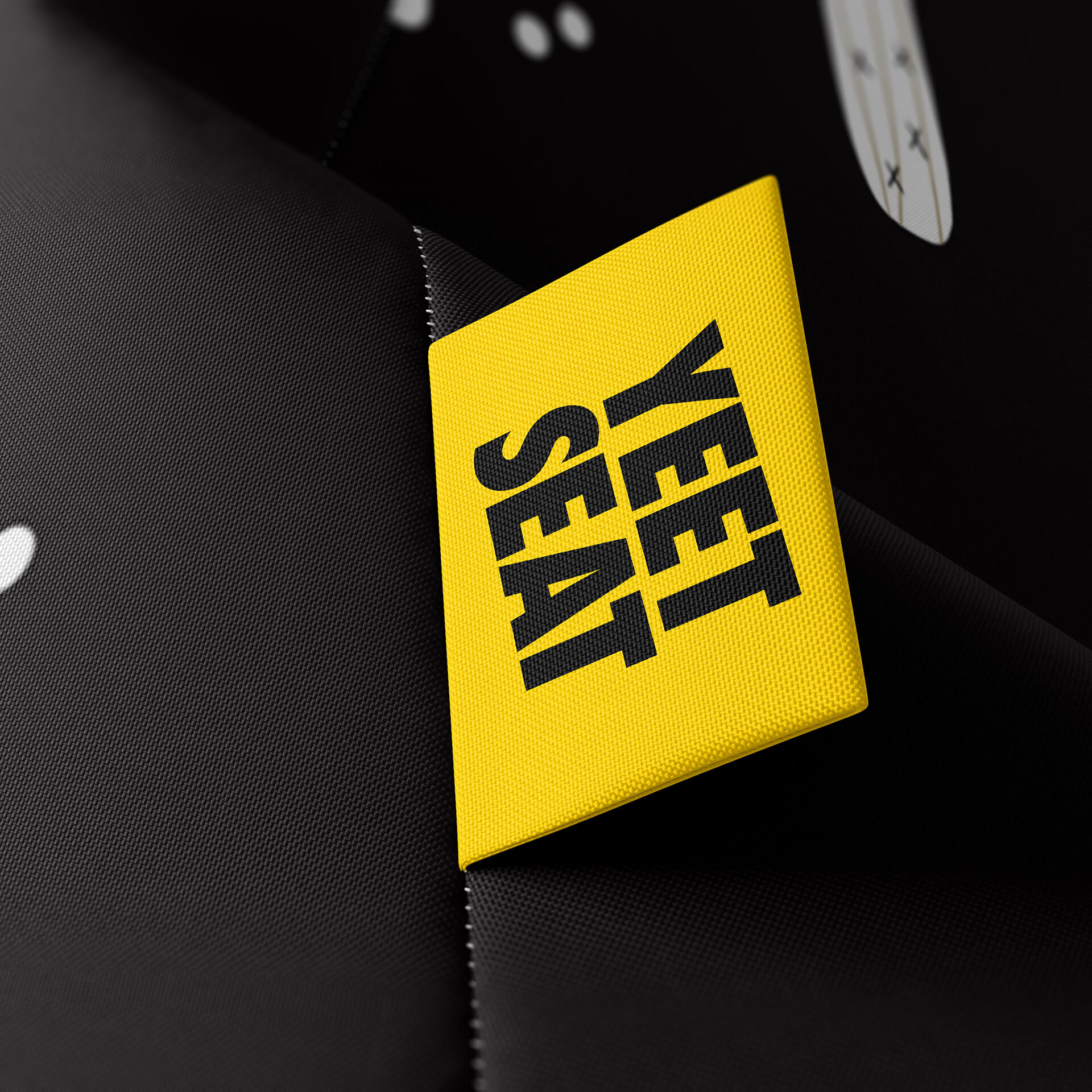 A vibrant Yeet Seat label on a bean bag side