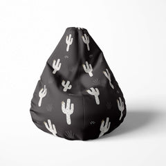 Front image of a beanbag with black background and white cactus illustrations.