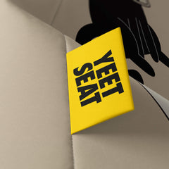 A vibrant Yeet Seat label on a bean bag side
