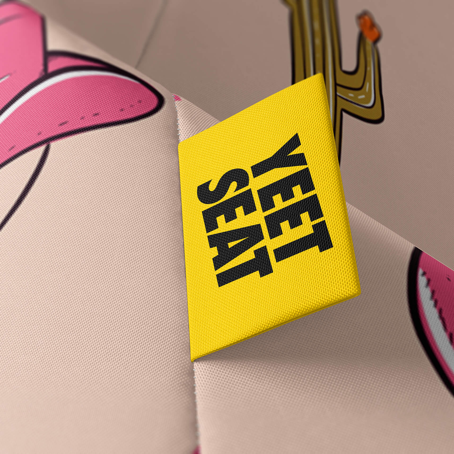 A vibrant Yeet Seat label on a bean bag side