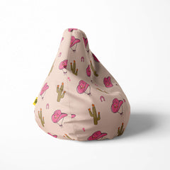 A right image of a beanbag with a pink cowboy hat and cactus pattern on beige
