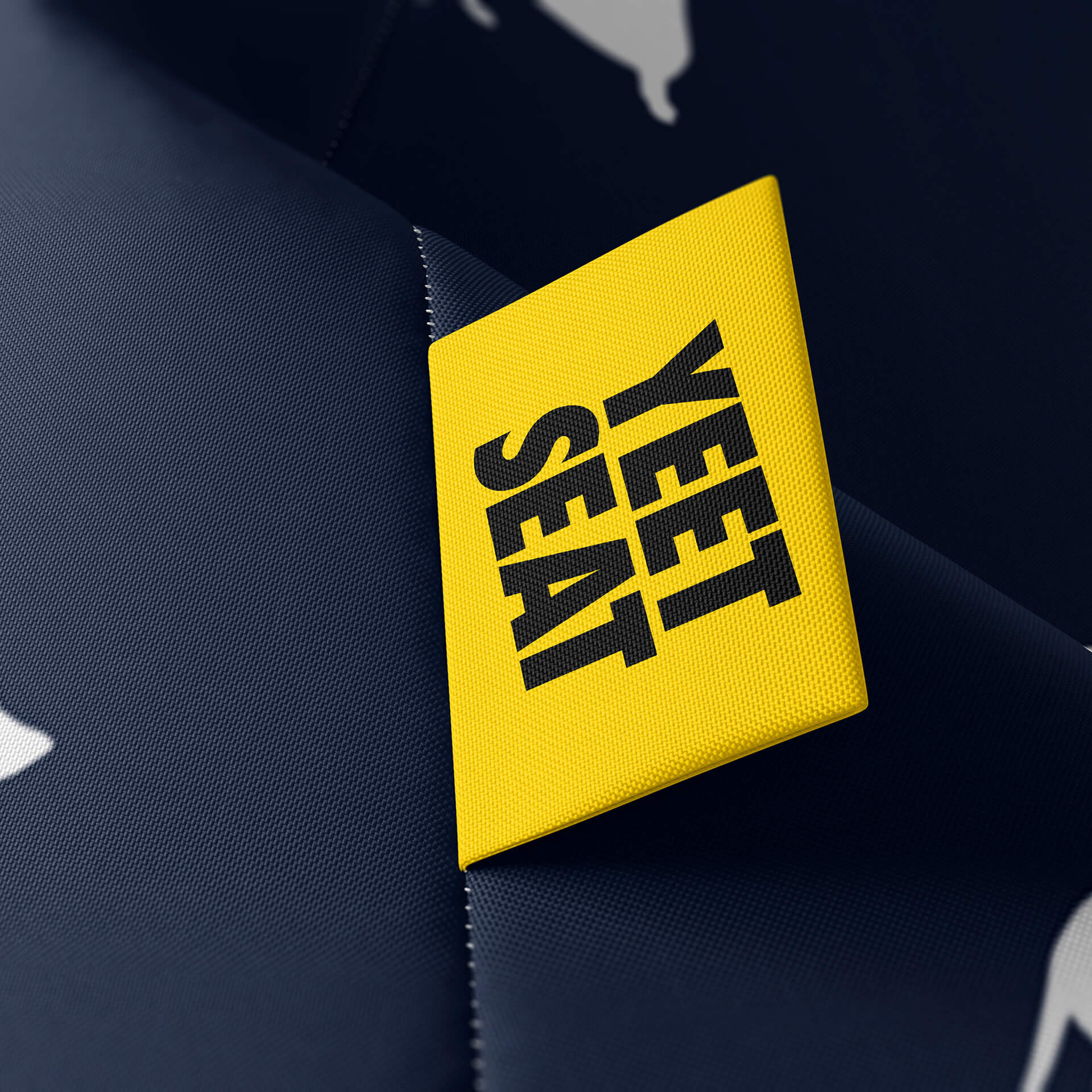 A vibrant Yeet Seat label on a bean bag side