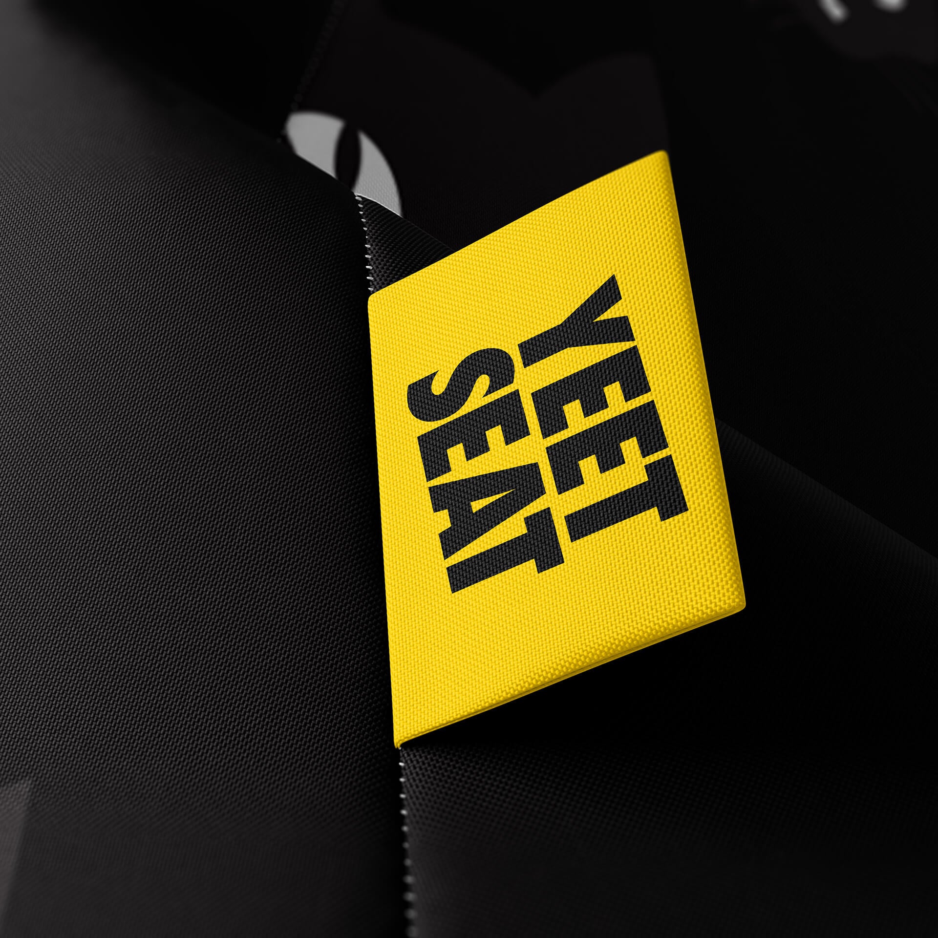A vibrant Yeet Seat label on a bean bag side