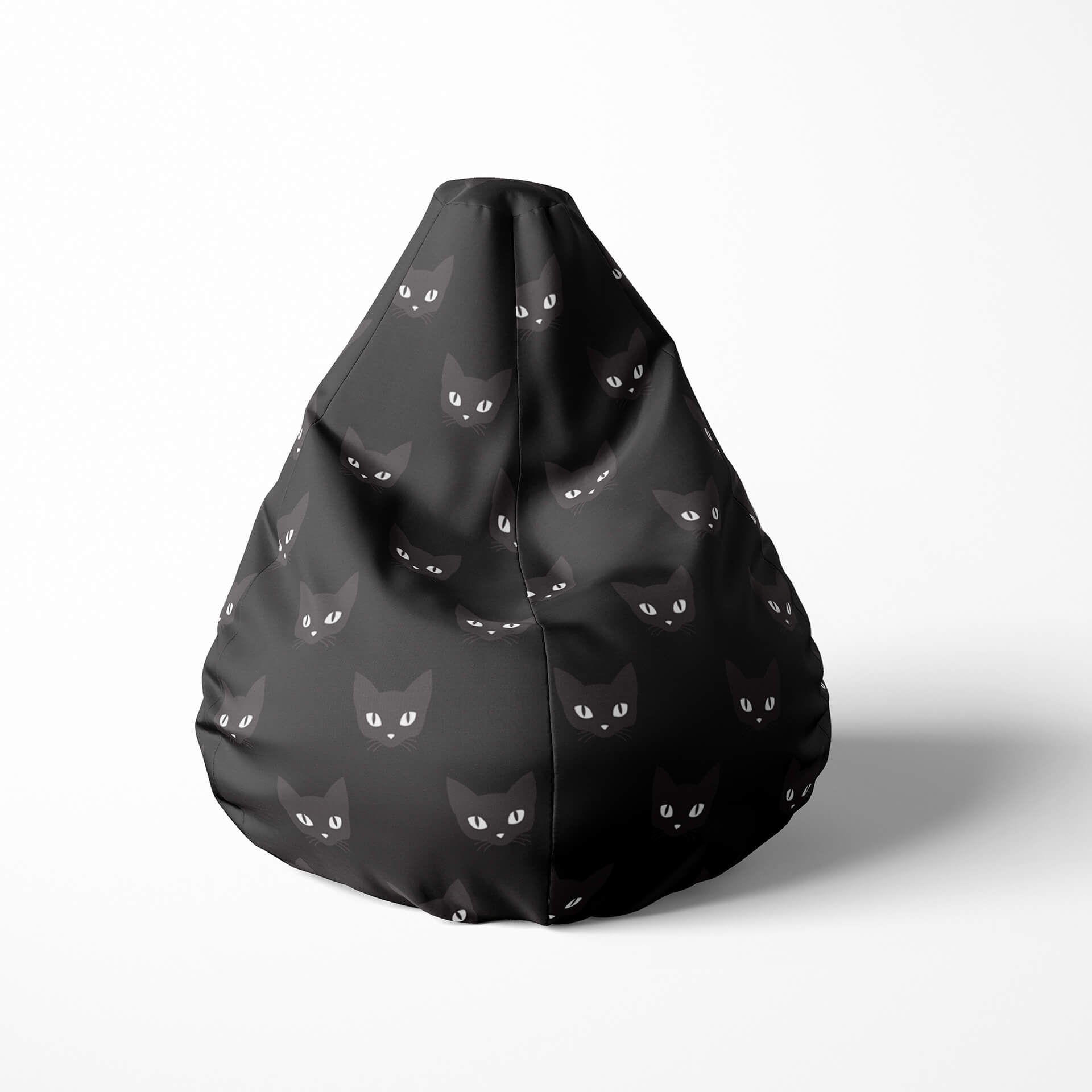 Front image of a beanbag with black cat faces on a dark background.