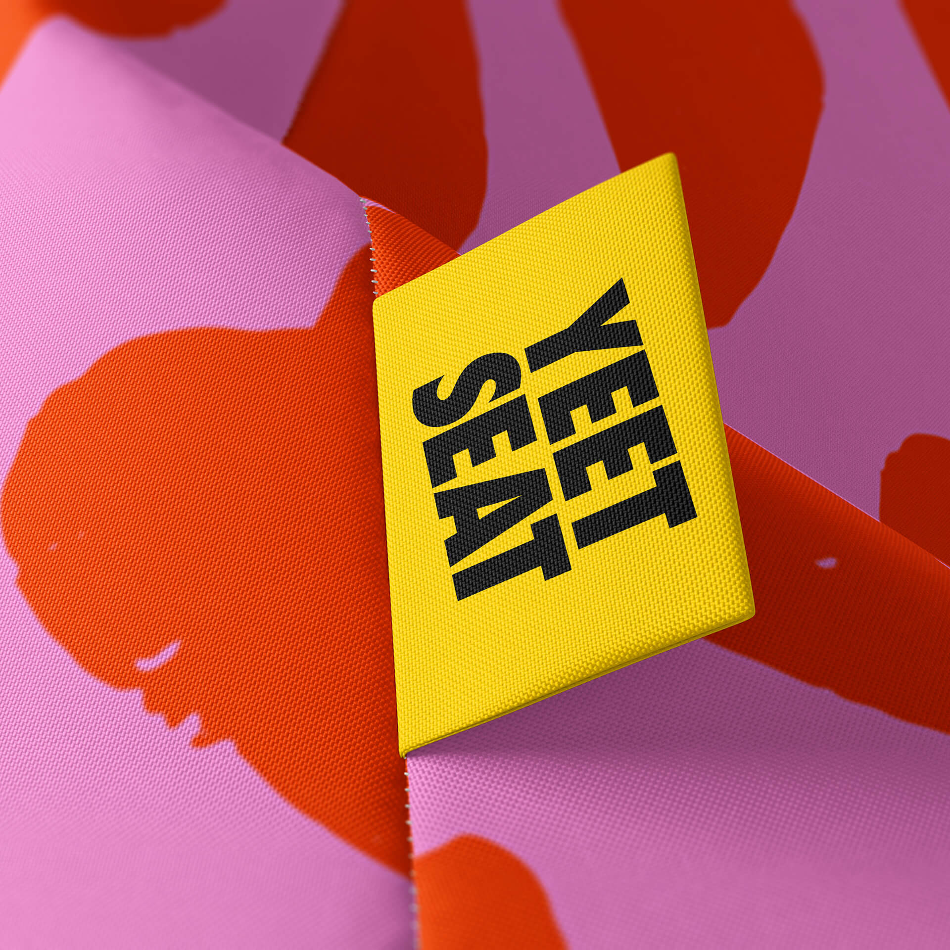 A vibrant Yeet Seat label on a bean bag side