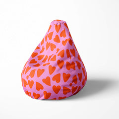 A left image of a pink and red heart beanbag on a white background