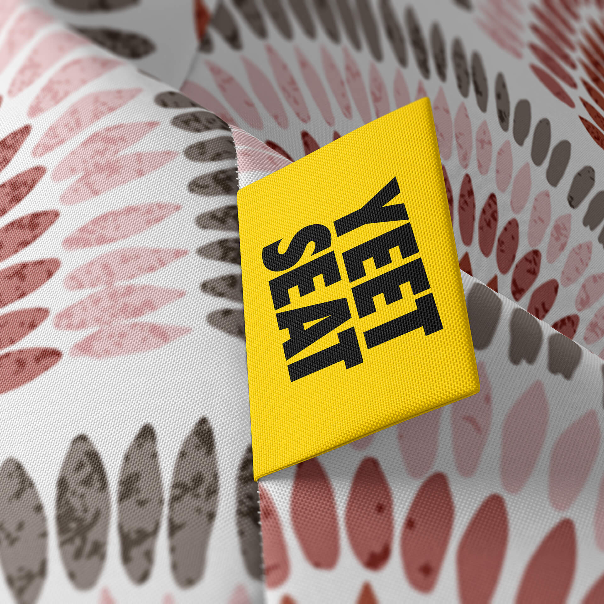 A vibrant Yeet Seat label on a bean bag side
