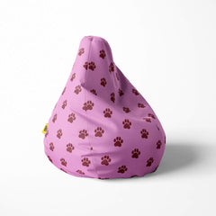 Right image of a beanbag with pink background and brown paw print pattern.