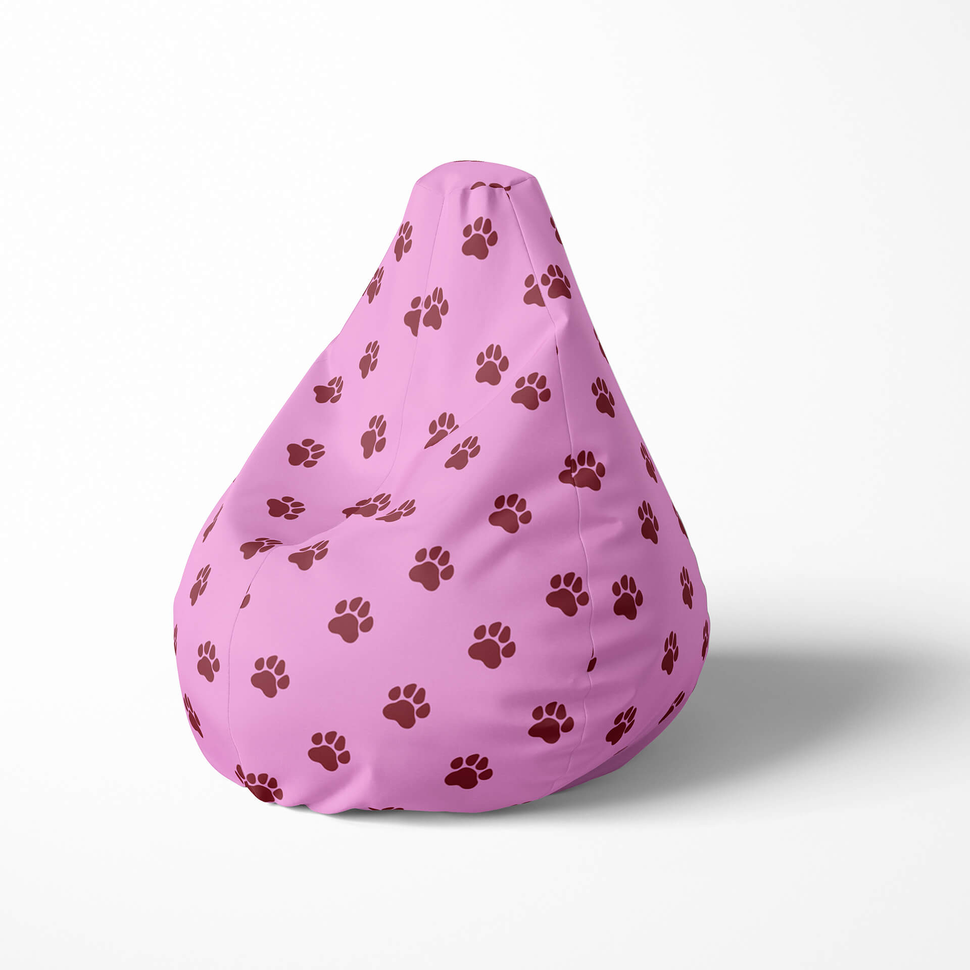 Left image of a beanbag with pink background and brown paw print pattern.