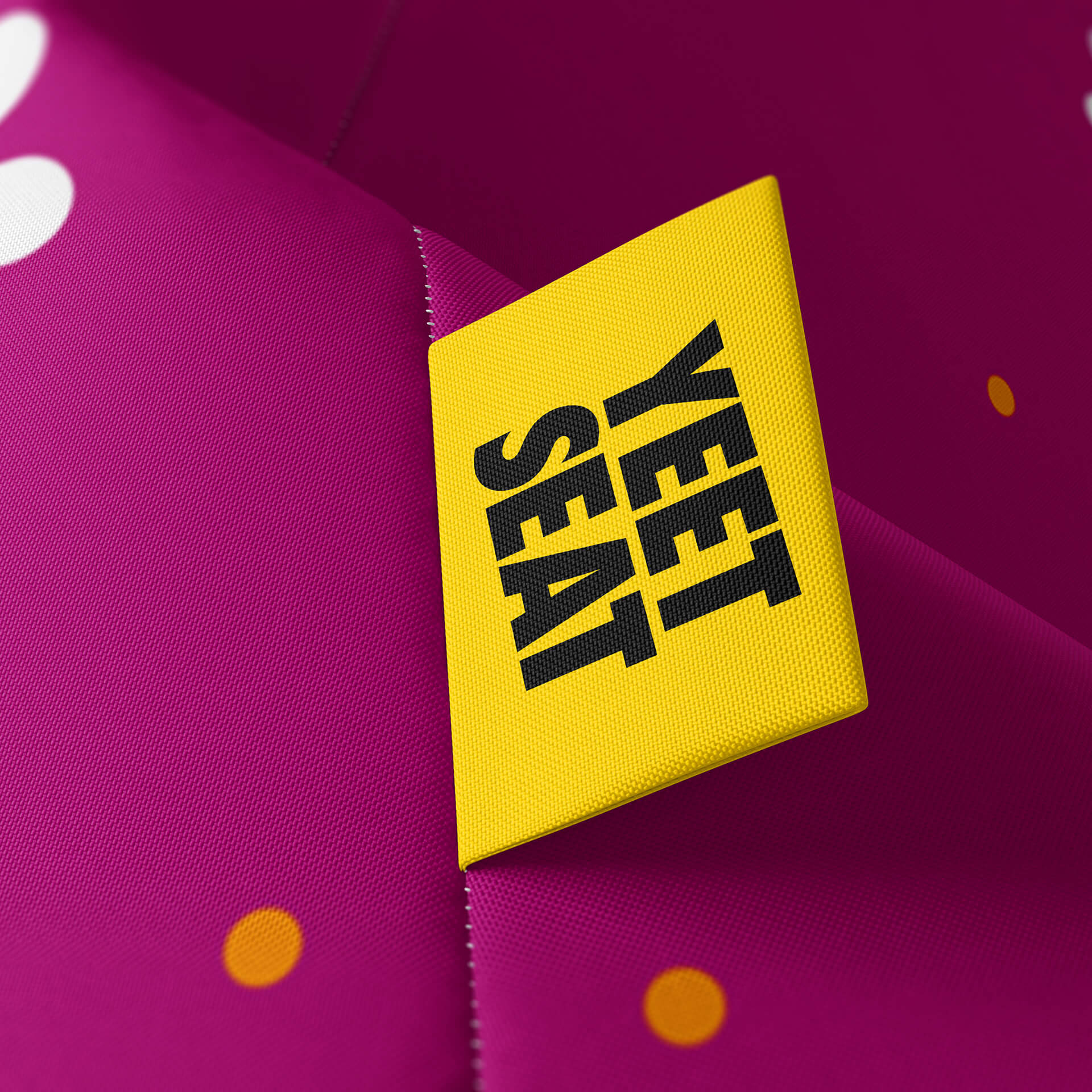 A vibrant Yeet Seat label on a bean bag side