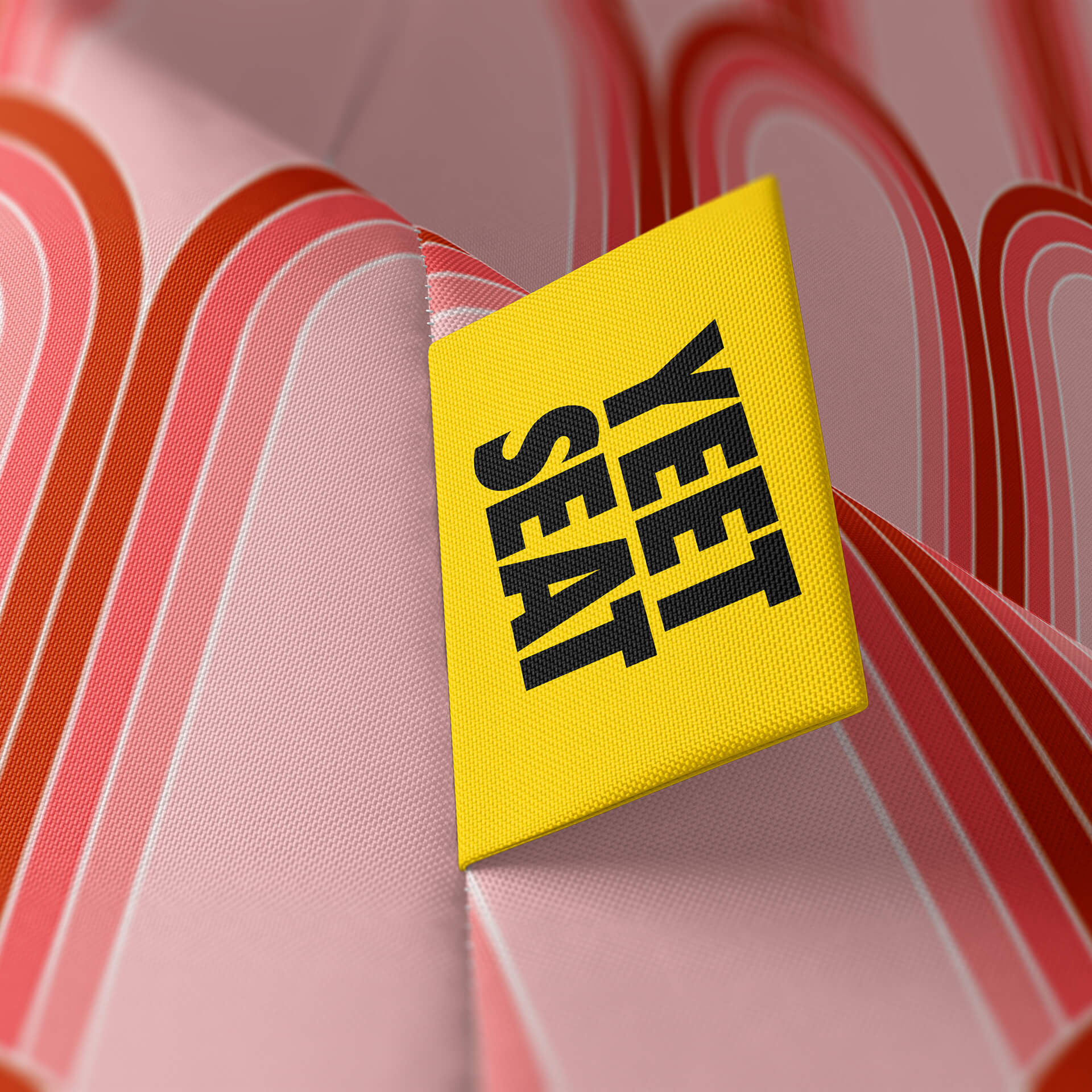 A vibrant Yeet Seat label on a bean bag side