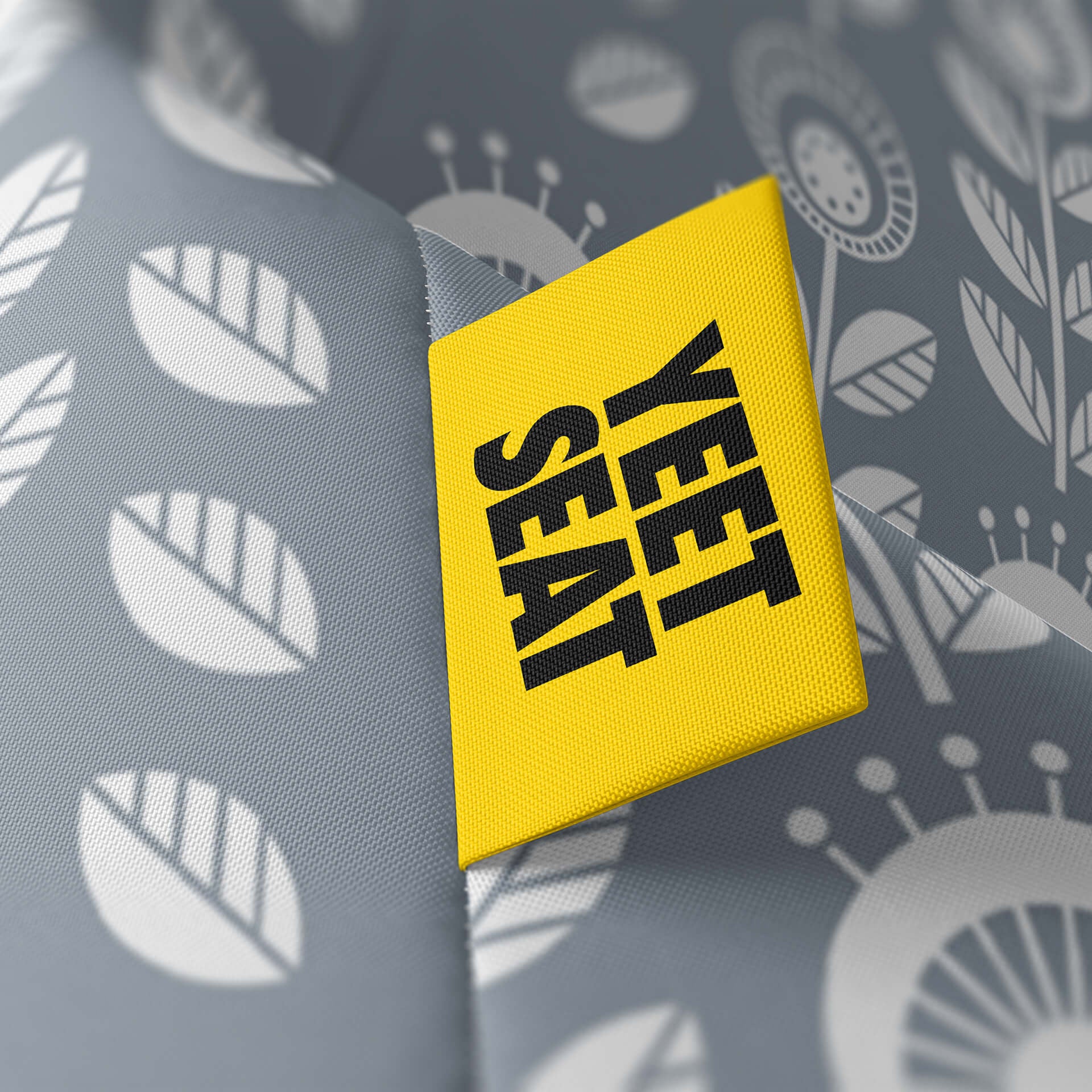 A vibrant Yeet Seat label on a bean bag side.