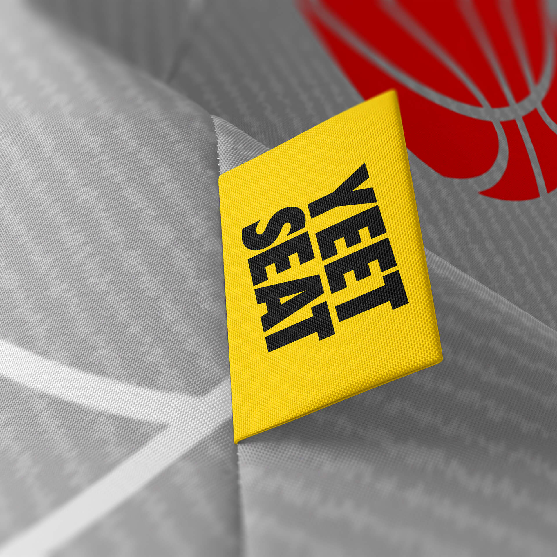 A vibrant Yeet Seat label on a bean bag side.