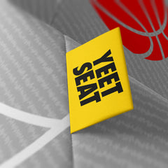 A vibrant Yeet Seat label on a bean bag side.