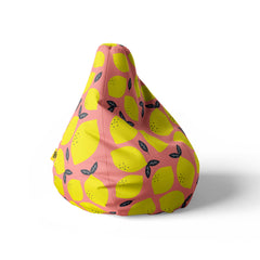 A right side image of a pink beanbag with lemon prints on a white background.