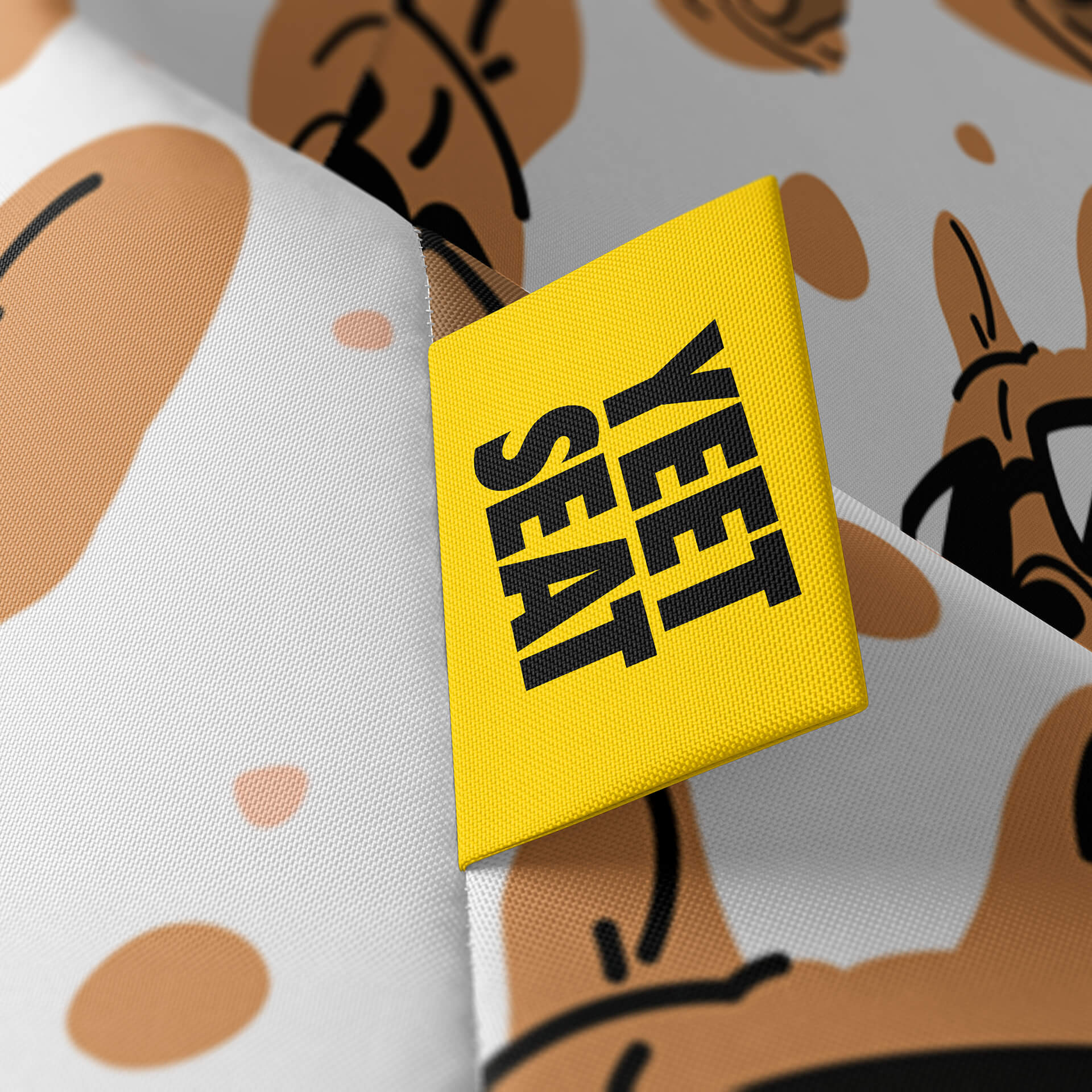 A vibrant Yeet Seat label on a bean bag side