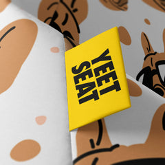 A vibrant Yeet Seat label on a bean bag side