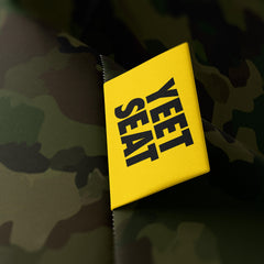 A vibrant Yeet Seat label on a bean bag side