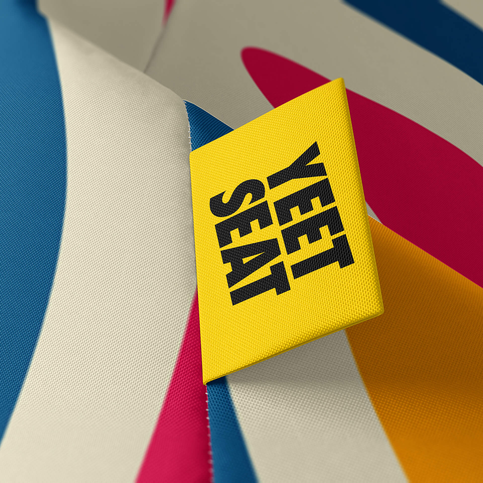 A vibrant Yeet Seat label on a bean bag side