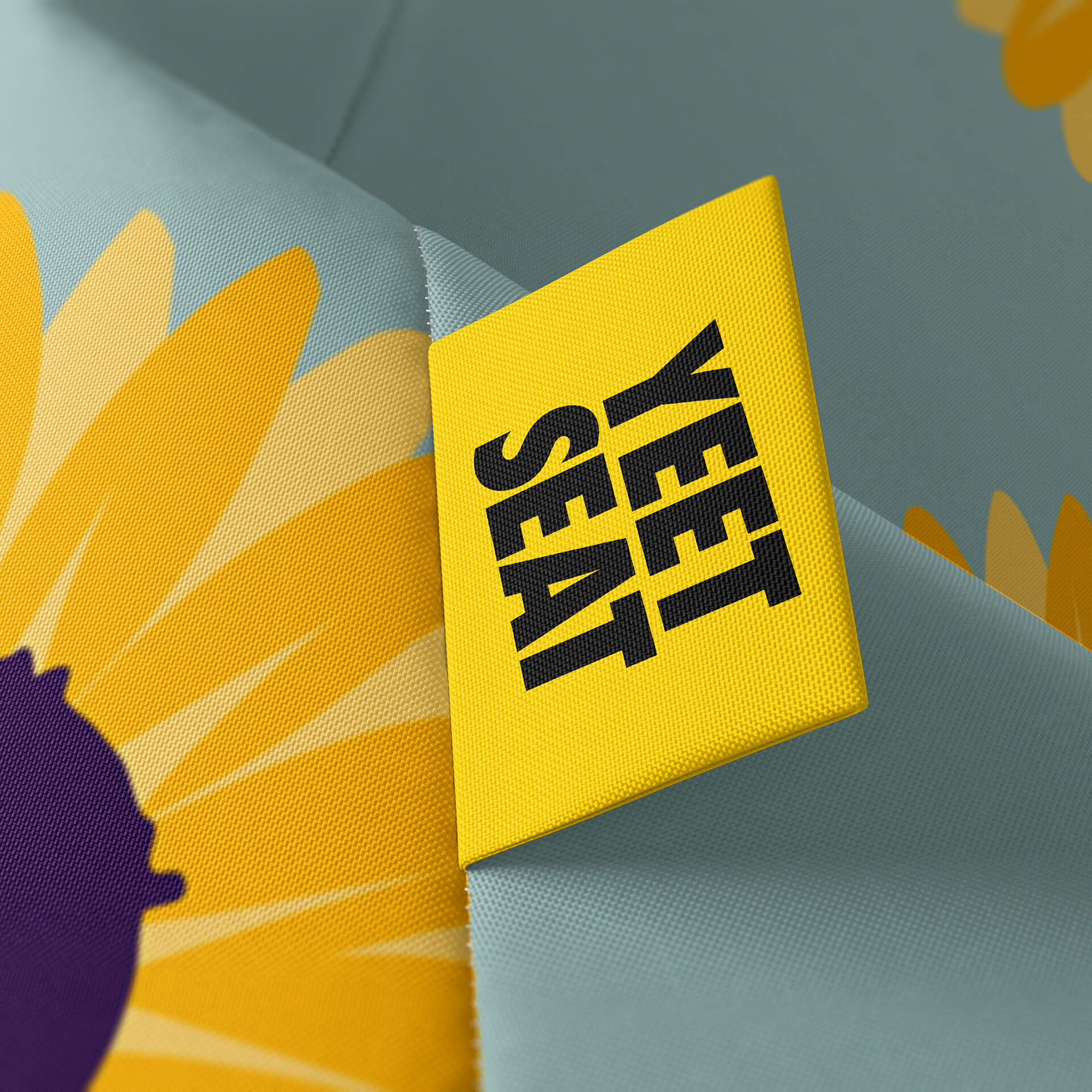 A vibrant Yeet Seat label on a bean bag side