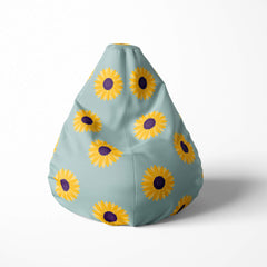 Front image of a beanbag with sunflowers on a light blue background.