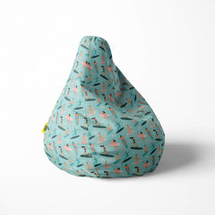Right image of a beanbag with a surfers pattern on a light blue background