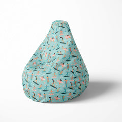 Left image of a beanbag with a surfers pattern on a light blue background