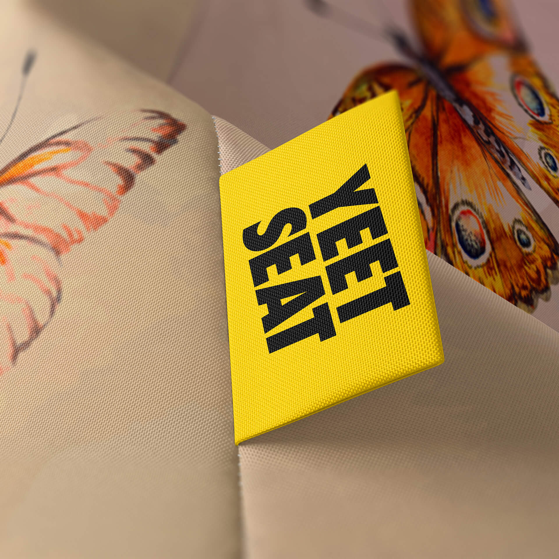 A vibrant Yeet Seat label on a bean bag side.