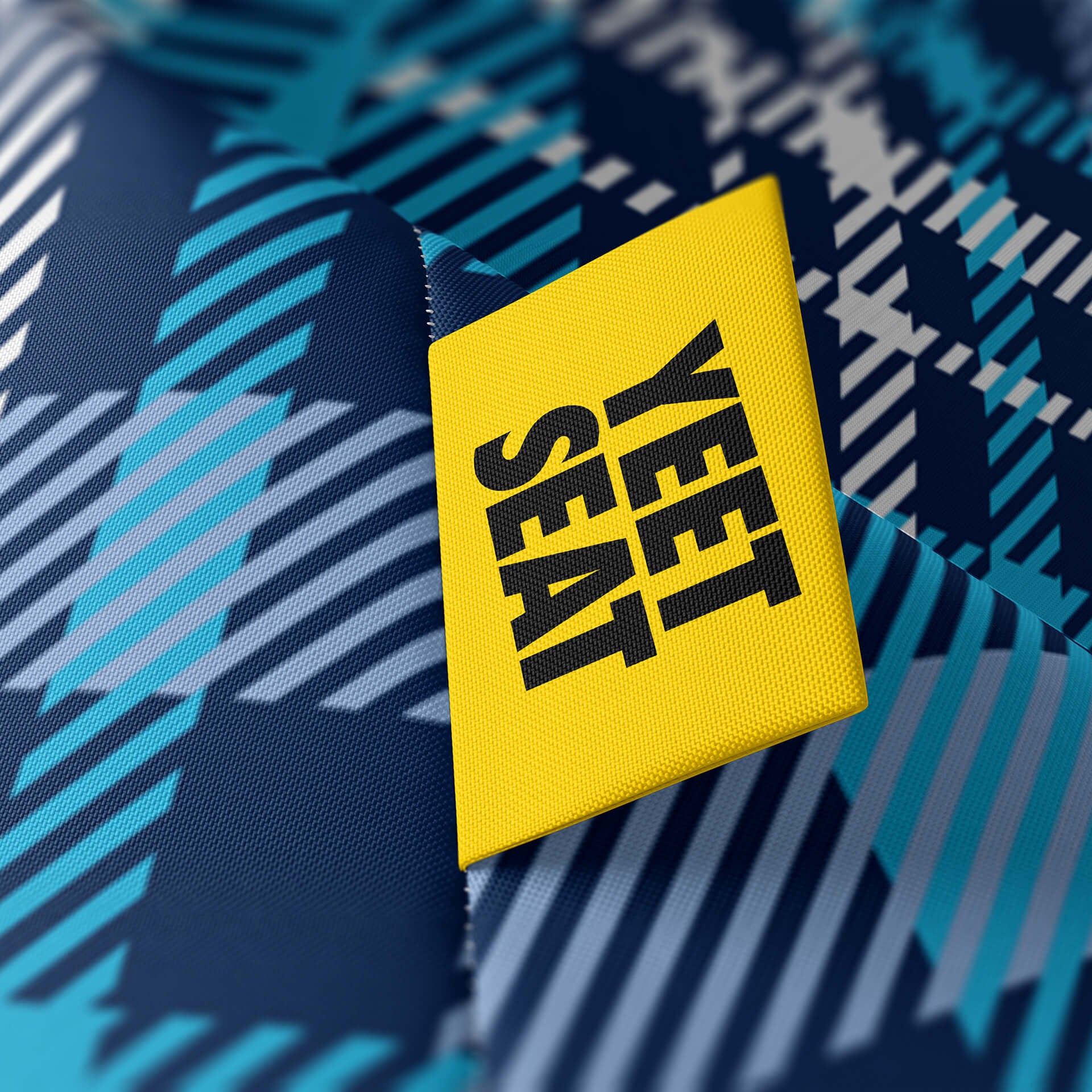 A vibrant Yeet Seat label on a bean bag side.