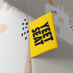 A vibrant Yeet Seat label on a bean bag side