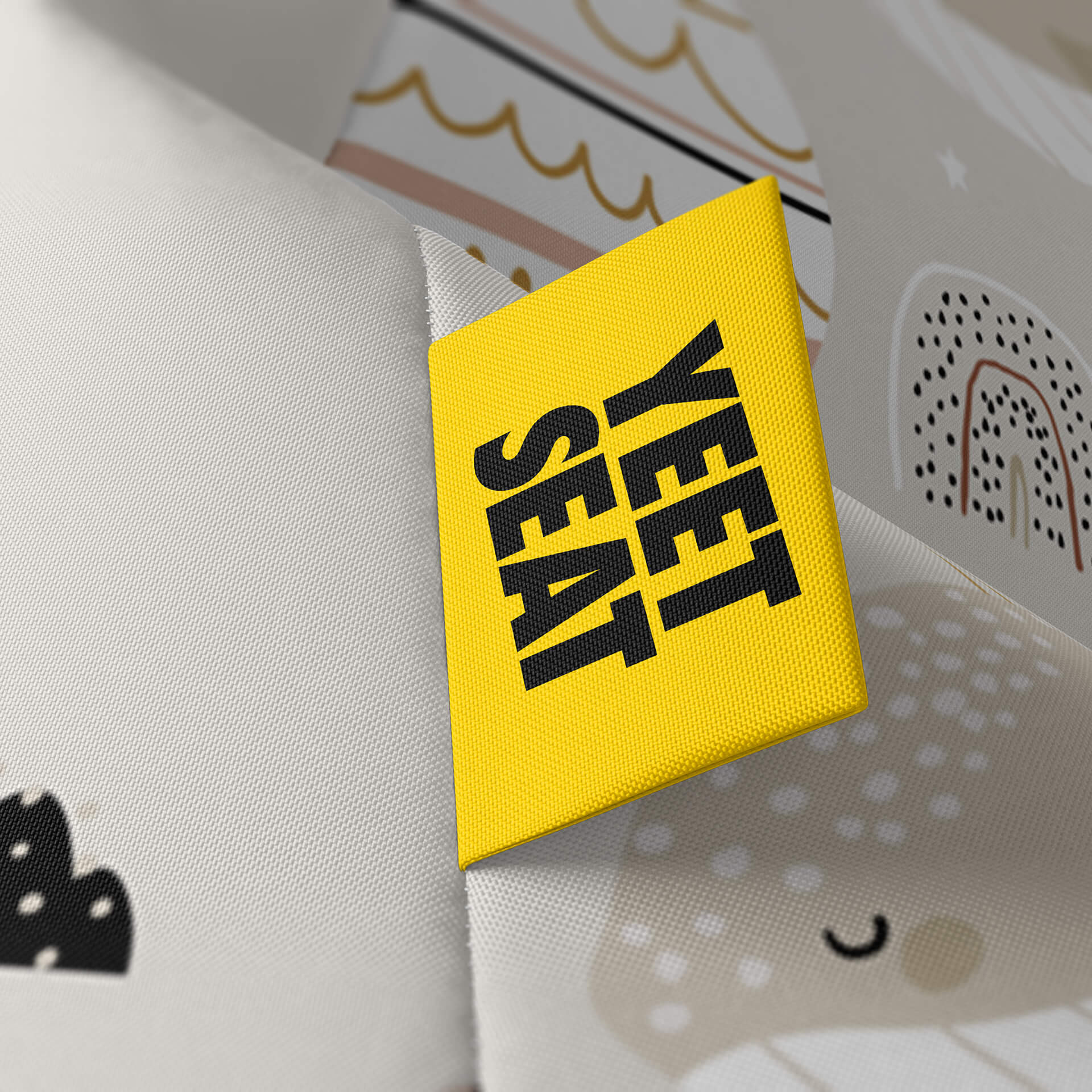A vibrant Yeet Seat label on a bean bag side
