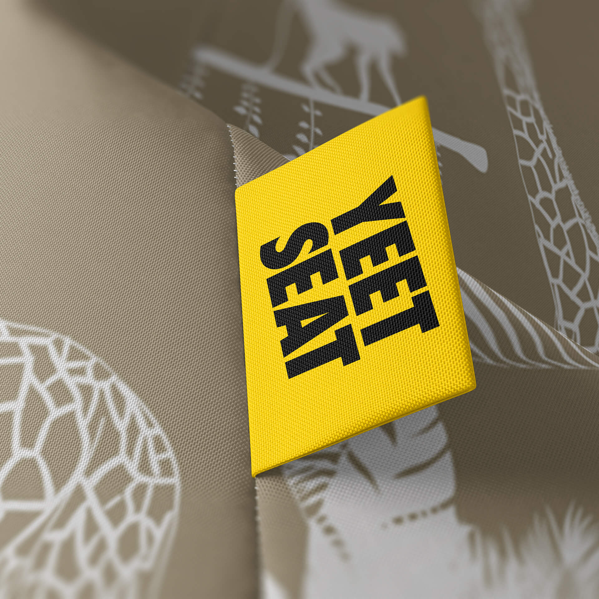 A vibrant Yeet Seat label on a bean bag side